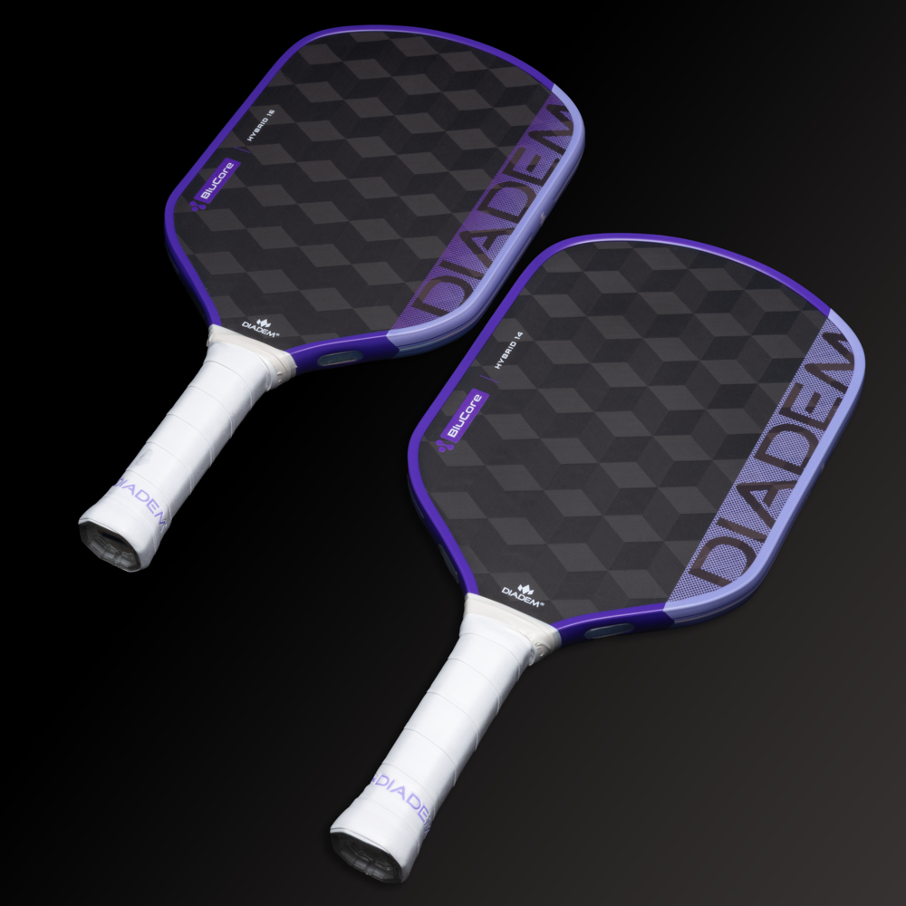 Two pickleball paddles with purple and white design on a black background