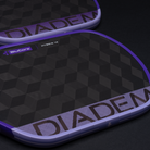 Two DIADEM products with a geometric pattern on a dark background